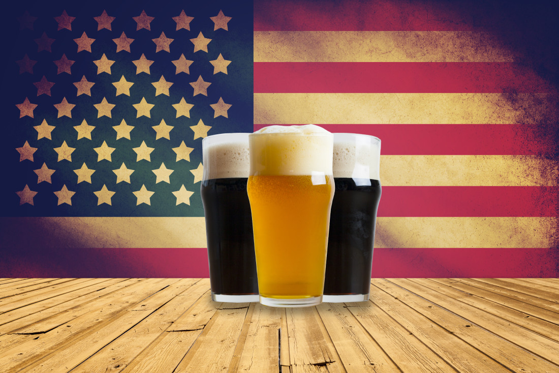 Image of three beers with an American Flag background
