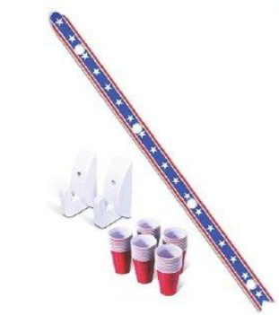 Ski-shaped cup holder having evenly spaced four cup holes from front to back, blue background with white stars along its length, and red lines along its edges; two white wall brackets; and 5 stacks totaling 50 red plastic cups.