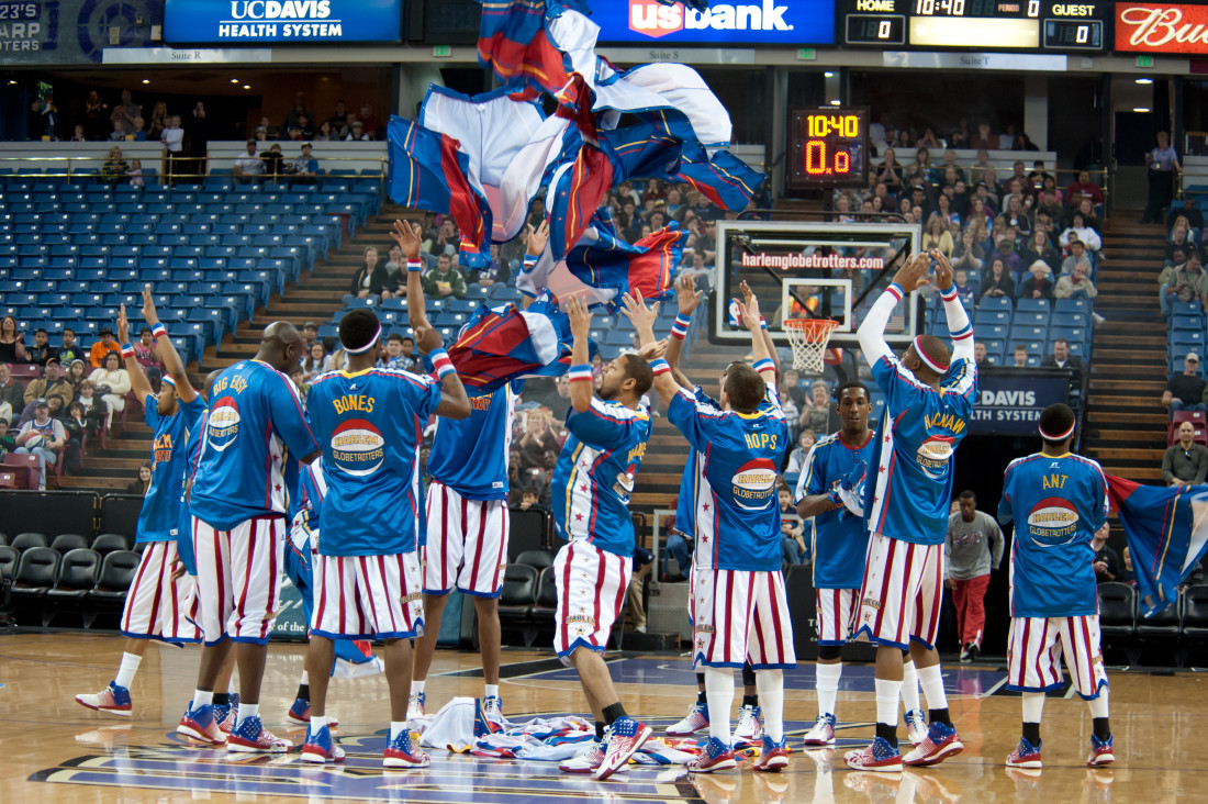 Photo of basketball team in outfits resembling the American Flag