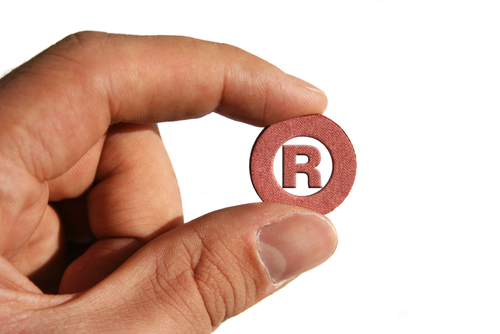 Trademark R Symbol in Hand