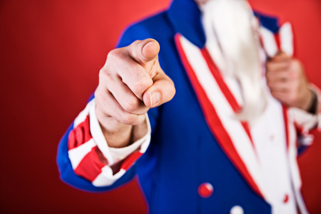 Photo of figure in suit resembling the American Flag
