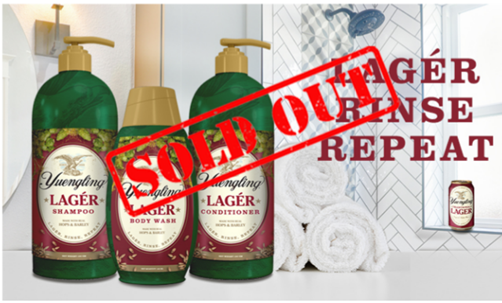 Bottles of Yuengling Lager Shampoo, Body Wash, and Conditioner with the slogan “Later Rinse Repeat” behind a red “SOLD OUT” stamp
