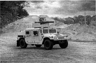 Exhibit showing Humvee vehicle with turret-mounted machine gun in Call of Duty game