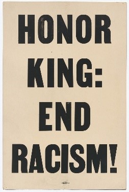 Poster reading "HONOR KING: END RACISM!" in block letters over a plain background