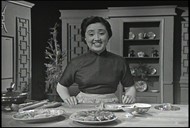 Photo of Joyce Chen in the kitchen.