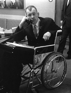 Justin Dart, Jr. on the telephone
