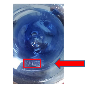 : Bottom of a blue water bottle displaying the molded letters PVPW