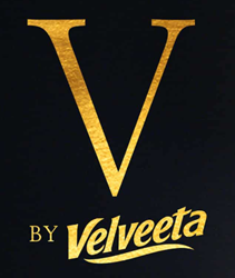 The letter V above By Velveeta all in gold with a dark brown background.